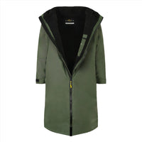 SALTIE Changing Robe in green, weather resistant, perfect for changing on the beach and made using 100% recycled materials. The SALTIE changing robe is designed keep you warm and dry during your sea swim, beach walks and all of your outdoor adventures.